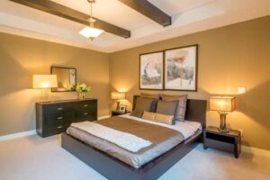 Bedroom with ambient lighting - ceiling light & bedside table lamps